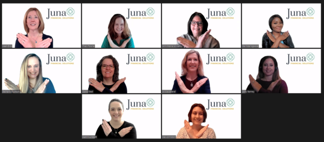Image of a group of Juna team members gathered together, raising their hands in celebration. The image is meant to celebrate the power of women and their achievements. The team members are all smiling and look confident, and they represent the diversity of women in the world. The image is meant to inspire viewers to join the fight for gender equality and empowerment.