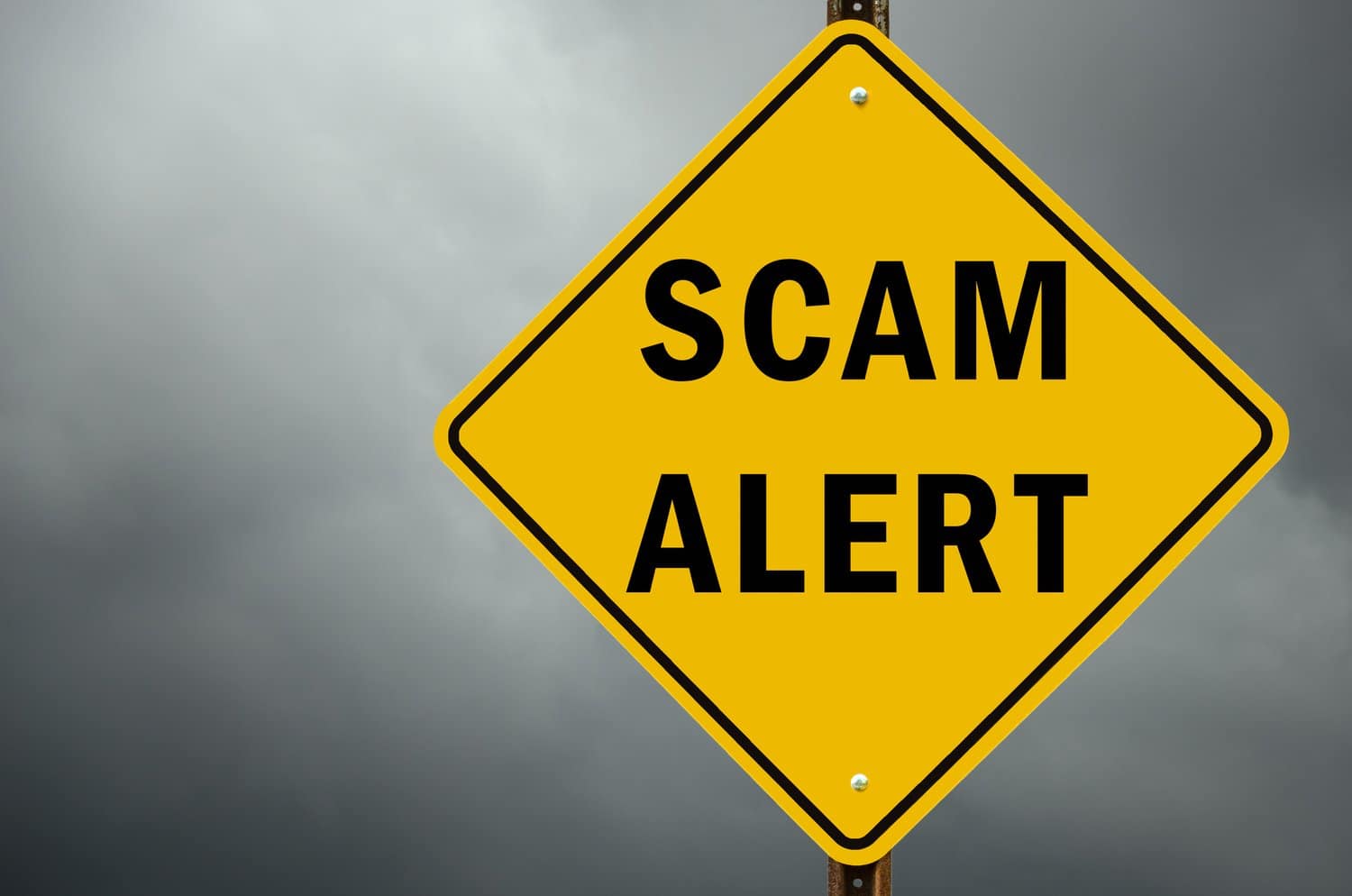 Image of a scam alert sign, designed to draw attention to the prevalent issues of payroll and vendor payment scams that affect businesses. The image serves as a warning and reminder of the importance of vigilance in fraud prevention.