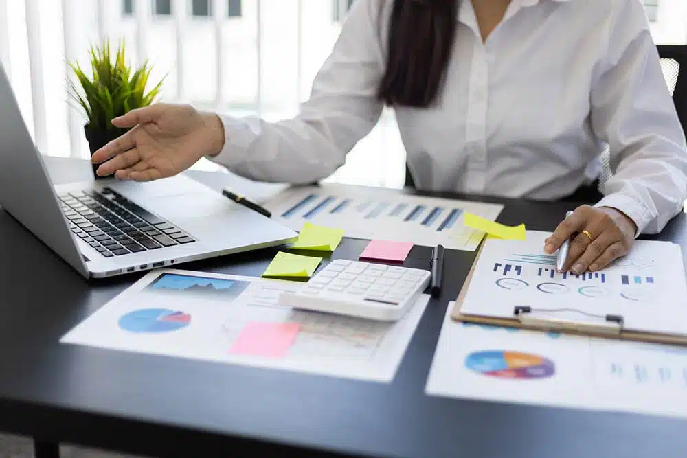 a woman going through outsourced bookkeeping