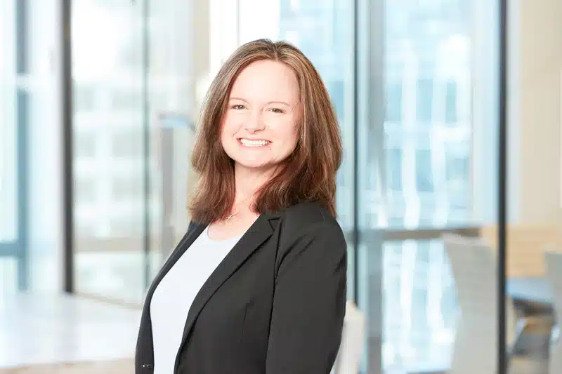 Traci Towne, Controller at Juna Financial Solutions, smiling in a professional headshot.